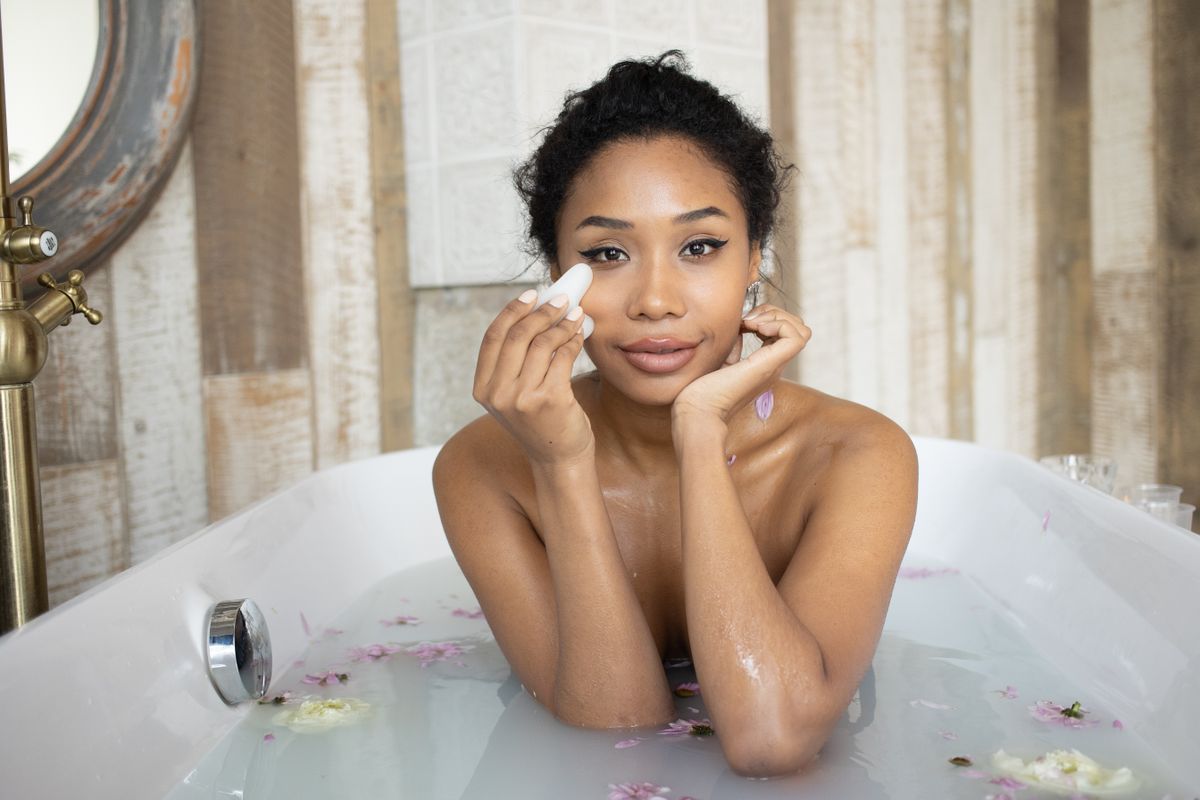 African woman enjoying a quiet wellness ritual